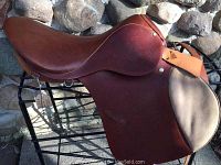 Full side view of saddle on stand