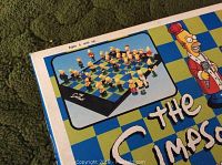 Box showing The Simpsons 3D chess set branding and age recommendation of 5 and up
