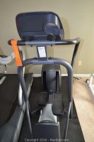 Front view showing handlebars, pedals and console