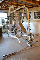 Full view of Smith machine rack with bench and floor bars