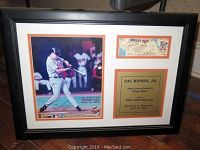 Full view of framed collectible including signed photo, game ticket, and plaque honoring Cal Ripken Jr's 3000th hit.