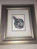 Frontal image of the framed Joe Wilson killer whale print showing the entire frame, matt, and print centered.