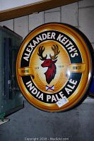 Front view of circular sign showing full Alexander Keith's India Pale Ale logo