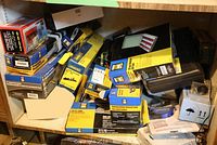 Shelf view showing multiple blue and yellow Power First product boxes