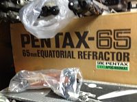 Cardboard box labeled “PENTAX-65 65 mm EQUATORIAL REFRACTOR” with SMC Pentax achromat label and plastic-wrapped components