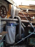 Full unit view with filter sock, collection bag, and corrugated intake hoses