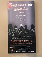 Front view of signed poster mounted on plaque