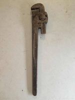 Full view of vintage 24 inch adjustable crescent wrench showing overall length and condition.