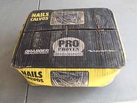 Top view of the full rectangular box showing Grabber branding, PRO Proven Quality logo, and statement about being the professional's choice.