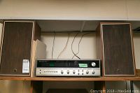 Front view of Noresco NRQ 275 receiver with two NEC565 speakers on either side