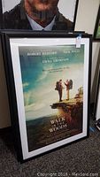Framed movie poster for 'A Walk In The Woods' featuring Robert Redford, Nick Nolte, and Emma Thompson, scenic outdoor image.