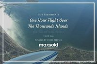 Front of gift certificate showing text, aerial photo and branding