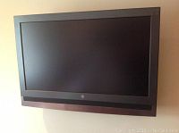 Westinghouse 36-inch flat screen TV mounted on wall