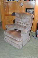 Side view of tan suede La-Z-Boy swivel rocker recliner with tufted back, arm and head covers included.