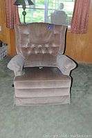 Front view of the tan suede La-Z-Boy recliner showing tufted back and arm covers
