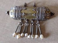 Front view of old Afghan silver tribal ethnic box style pendant with detailed beaded and embossed gilded design. Shows 8 freshwater pearl dangles attached by coiled springs.