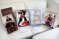 Four different Mattel Barbie dolls from 1996 in their original packaging featuring the Couture, Illusion, Harpist Angel, and Heartstring Angel dolls.