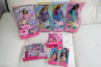Photo showing eight Barbie-related boxed items: Barbie Kitty Fun doll, Fashion Kitty accessory set, Fashion Fairytale poodle playset, and five Friends of Barbie dolls (Skipper, Courtney, Nikki, Chelsie, Jenny).