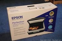 Photo of Epson Perfection V500 Photo scanner box showing product image and branding