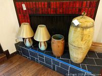 Group shot of all items on fireplace hearth