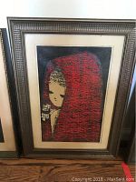 Framed vintage Japanese serigraph print of girl in red cloak holding flowers, full view