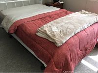 View of assembled bed with bedding