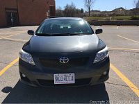 Front exterior view of dark grey 2009 Toyota Corolla
