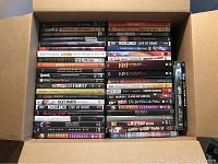Wide view of box showing two stacks of assorted music DVD spines
