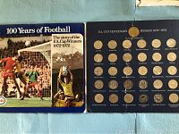 Front view of two blue display boards with all centenary medal coins, title '100 Years of Football' and 'F.A. Cup Centenary Medals 1872-1972'