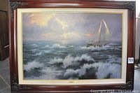 Fully framed lithograph showing sailboat on turbulent ocean under cloudy sky.
