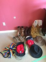 All items displayed together on floor against pink wall
