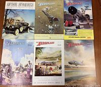 Photo of six magazines including five Aeroplane magazines mostly from 1954 and one Antique Automobile magazine from 1965, showing their front covers.