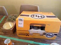 Boxed Casa Elite set of four demitasse cups and saucers in original packaging with foam inserts.