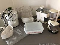 Full view of all items in the lot including appliances and casserole dish.