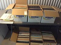 Six 1.5 cube Dymon Storage boxes on and under table filled with assorted vinyl records, mainly classical and foreign music