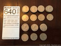 All the coins arranged in groups showing obverse and reverse sides of the Canadian nickels from 1929 to 1936.