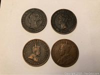 Obverse sides showing monarch profiles of the four coins dated 1896, 1901, 1902, and 1917.