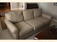 Front view of full couch showing three-seat configuration
