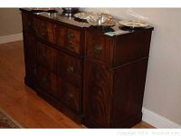 Front view of buffet sideboard showing five drawers and two cabinets