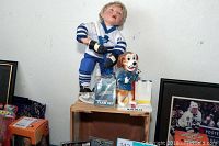 Close-up of 2004-2005 Florida Everblades bobblehead dog and Maple Leaf player bobblehead.