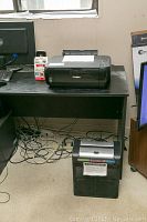 Canon MP280 all-in-one printer and Embassy TQ80Mc shredder on black desk, visible cables underneath