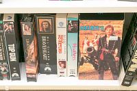 DVD and VHS titles including Top Gun, Passion of the Christ, Legend, Braveheart, No Return, Heathers, and Sharpe's VHS boxed set