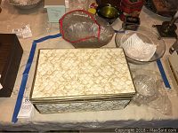 Overview of crystal and glassware lot on table including boxes and bowls