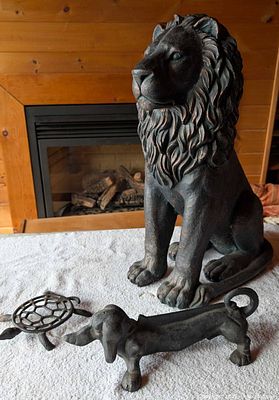 Lion statue, cast iron dachshund boot scraper, cast iron turtle trivet ...