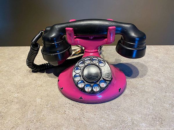 Vintage pink rotary dial telephone | Maxsold