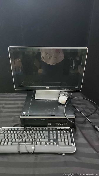 Windows 7 Computer Used HP Windows 7 desktop computer, monitor, keyboard, mouse | Maxsold