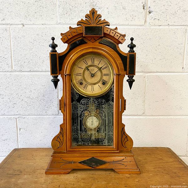1887 Ansonia wooden mantel clock with key | Maxsold
