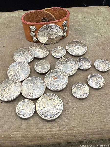 Assorted U.S. coin concho buttons and leather cuff | Maxsold