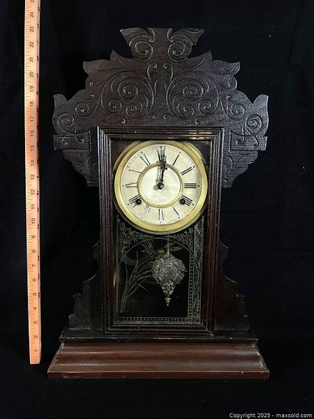 Antique carved wooden mantel clock with pendulum and key | Maxsold