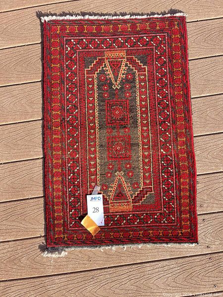 Small woven rug 21x32 in | Maxsold